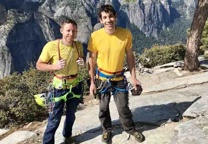 Alex Honnold taking a picture with Tommy Caldwell.